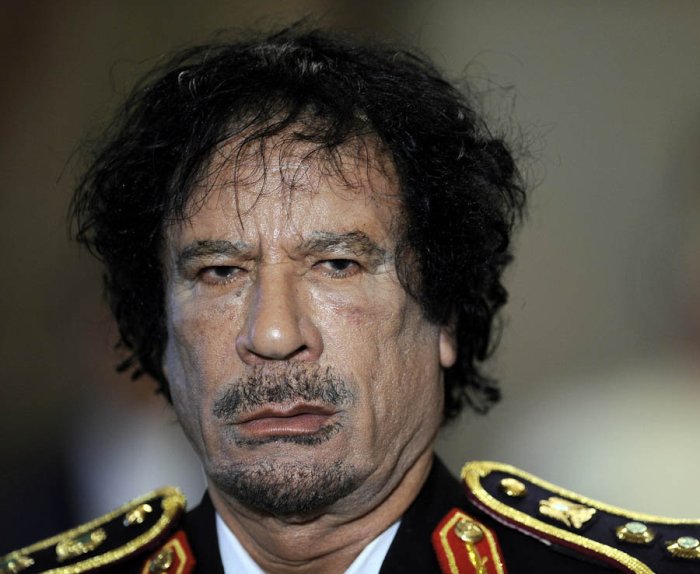 Dictator killed gadhafi people moammar leader libya eccentric military obituary tripoli own his talks 40th evacuation ceremony libyan anniversary mark